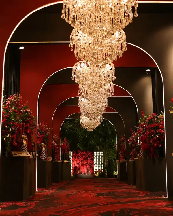 We believe every event should have a grand entrance. For this royal-themed cocktail affair, we designed a dramatic arched walkway with cascading crystal chandeliers, setting a tone of pure luxury and anticipation from the very first step.