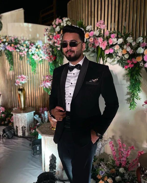 For a classic cocktail night or a formal corporate gala, I always come dressed to impress. A sharp black tuxedo look is perfect for setting a sophisticated and stylish tone before I hit the dance floor.