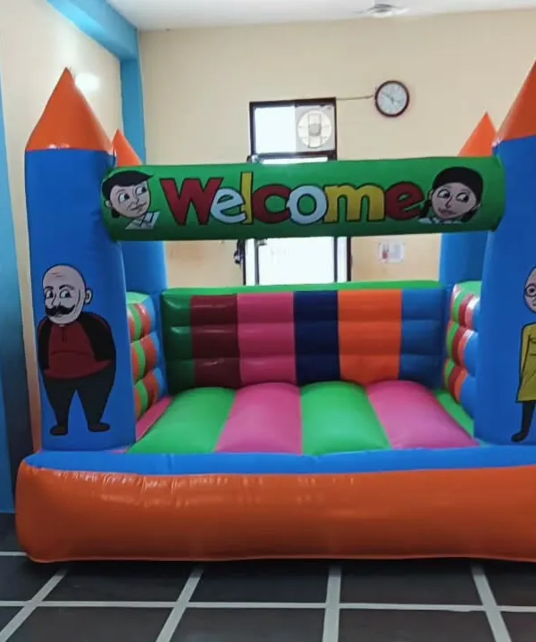 An 8x8 foot jumping bouncy with a "Welcome" banner and cartoon characters. Its compact size makes it suitable for indoor use or small outdoor spaces.
