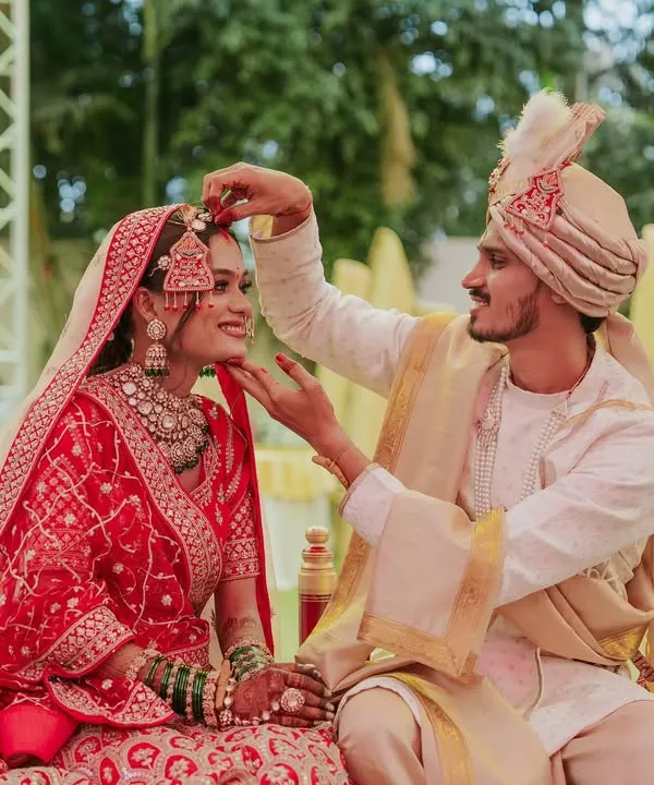 A tender moment between the bride and groom during their wedding ceremony. I look for these small, intimate gestures that show the deep connection between a couple.