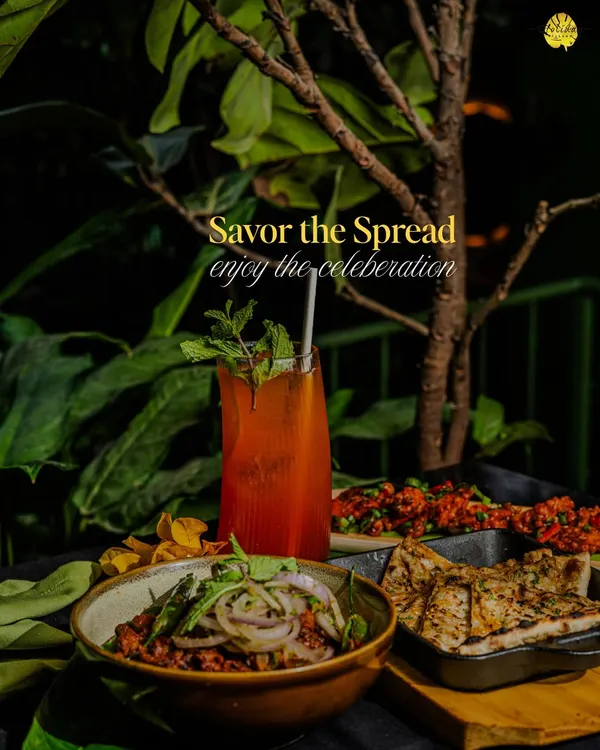 Savor the spread. We believe in creating a complete dining experience with delicious food, refreshing drinks, and a beautiful setting that enhances every bite.