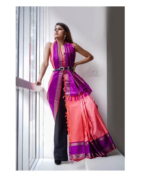 A modern, high-fashion take on the Kanchipuram saree. By styling it over pants with a belt, we created a powerful and unique editorial look that redefines traditional wear.