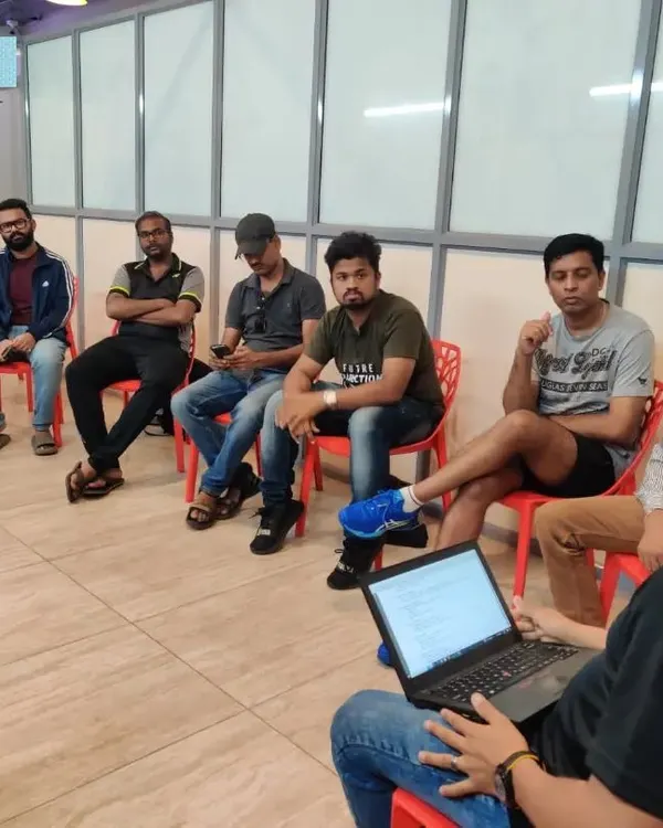 The foundation of a great tournament is clear communication. Here, I am conducting a briefing session with team managers for a corporate championship, ensuring everyone understands the schedule and rules.