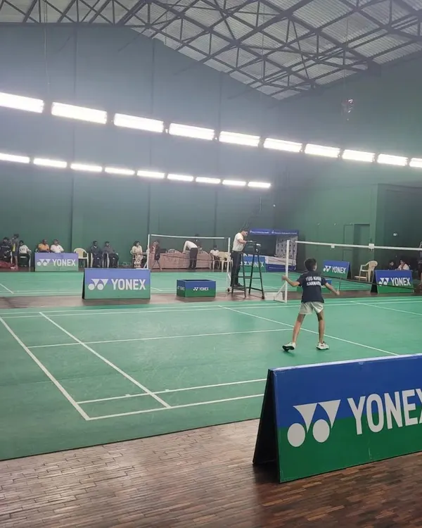 A view of the courts during the Yonex Sunrise Karnataka State Mini & Sub Junior Badminton Championship, hosted at our high-performance training center.