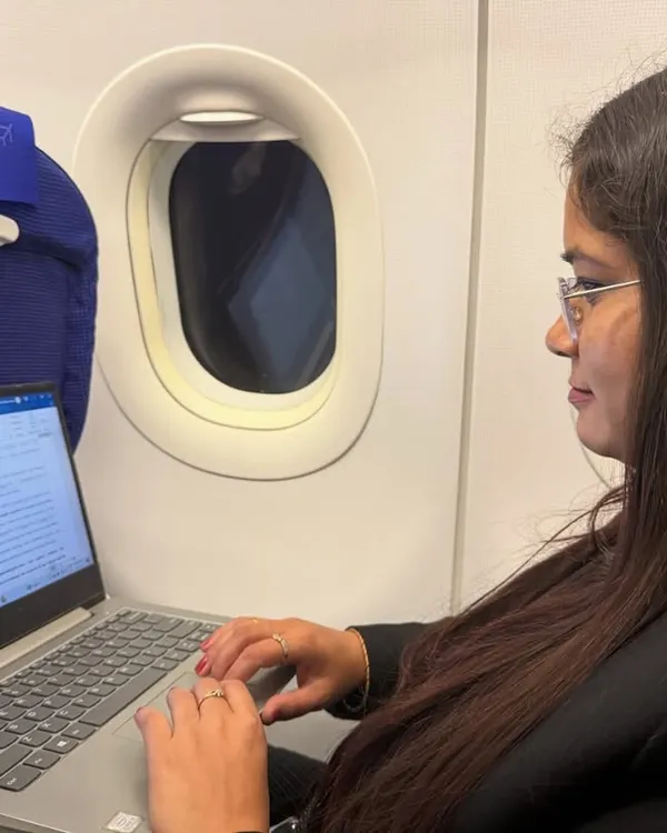 Work doesn't stop, even at 30,000 feet. Preparing for a case while in flight.