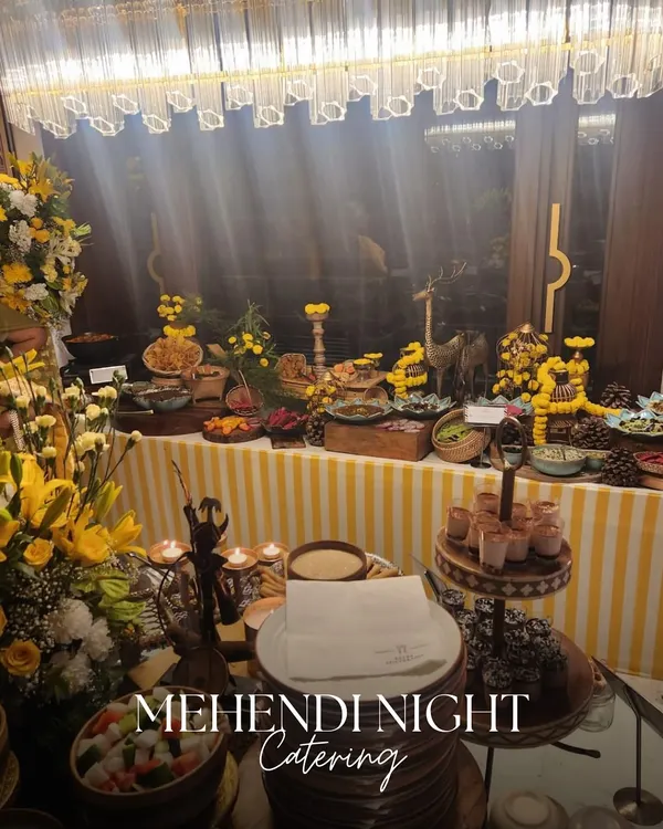 For this Mehendi night, we created a vibrant yellow-themed buffet that matched the festive decor. The spread included a variety of appetizers and main courses for guests to enjoy.