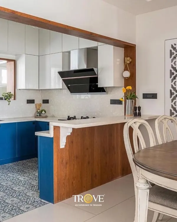 This kitchen showcases a beautiful blend of styles. The patterned floor tiles add a classic touch, while the simple white backsplash provides a clean, modern look that is easy to maintain.