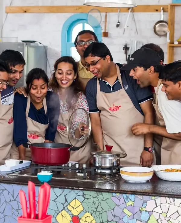 (Hero Media) We believe the best memories are made when we cook and eat together. Here, a team discovers the joy of creating something delicious from scratch, gathered around a steaming pot in our studio. This is what our hands-on cooking workshops are all about.