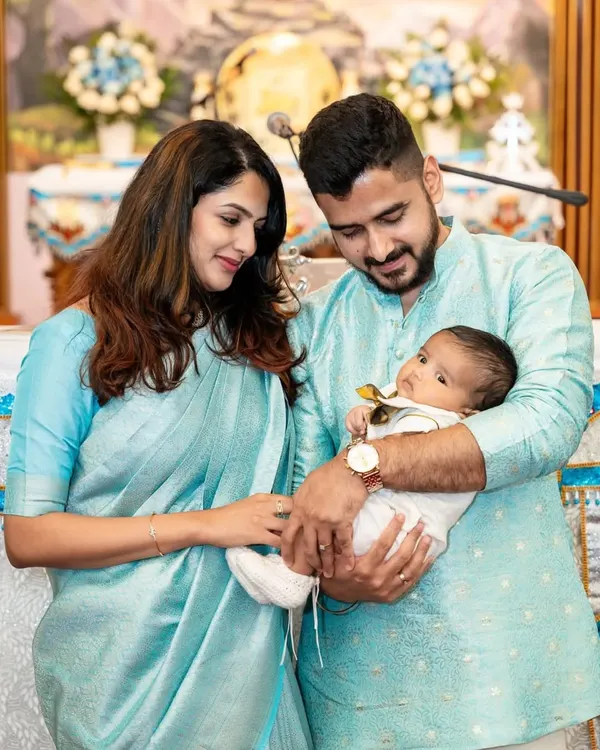 A beautiful family portrait during a welcome baby or christening ceremony. I capture these tender first moments with your newborn.