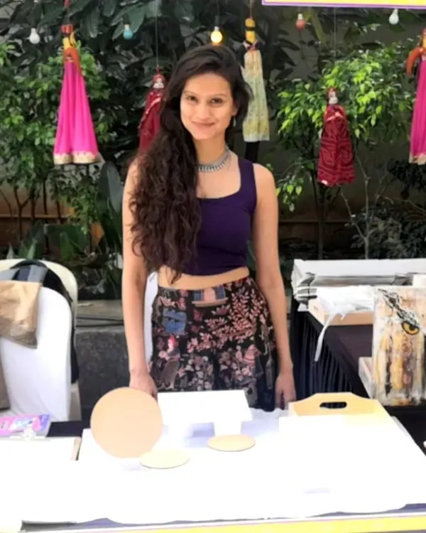 Here I am at my stall during 'The Village' flea market at JW Marriott. I love meeting new people and sharing my passion for art in person.