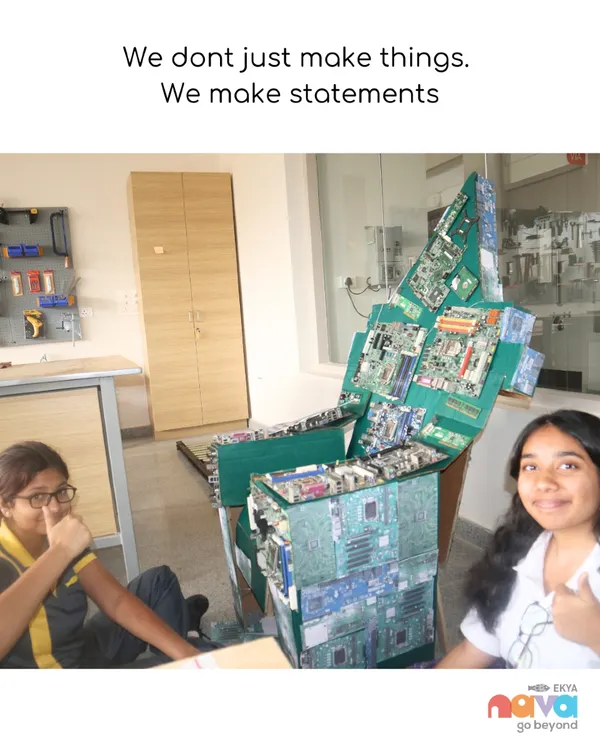We don't just make things, we make statements. Here, students repurposed old electronic circuit boards to create a functional chair, a powerful statement on sustainability and design.