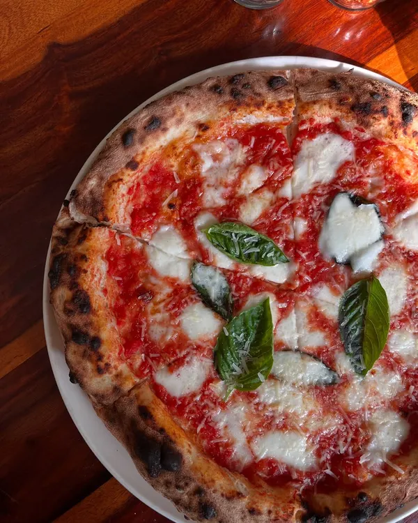 Pizza the way it was meant to be. Our Margherita has no frills, just pure flavour from high-quality tomatoes, fresh mozzarella, basil, and our signature dough.