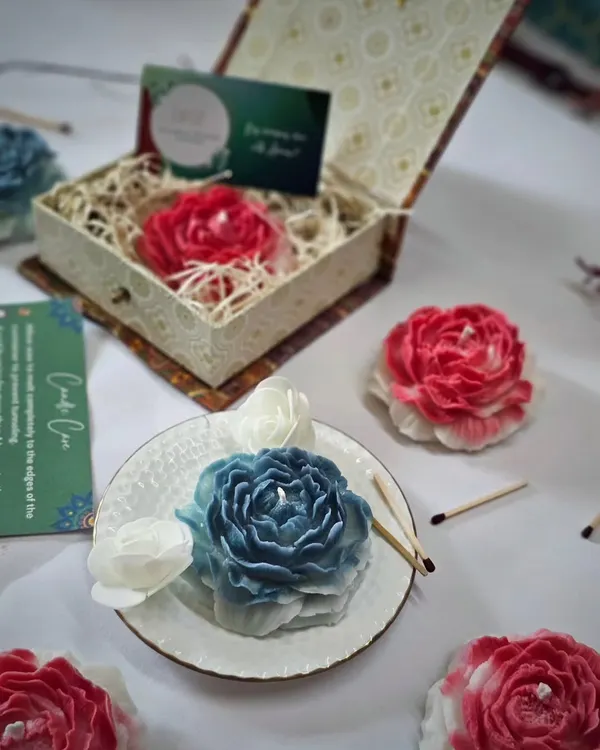 My Scented Peony Candles, shown here in a premium gift box and displayed on a plate. Their gentle glow transports you to a world of timeless elegance and tranquility.