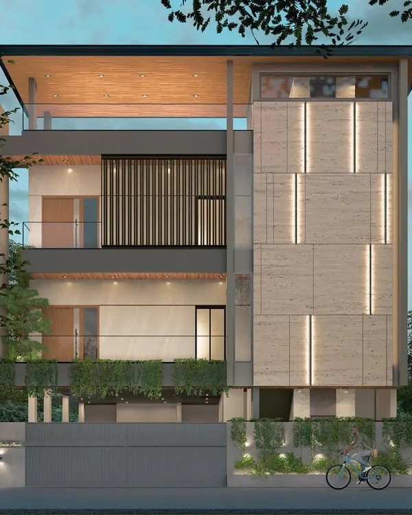 This facade design for a modern residence plays with texture and light. The combination of travertine marble, vertical green walls, and integrated LED lighting creates a dynamic and sophisticated exterior that changes character from day to night.