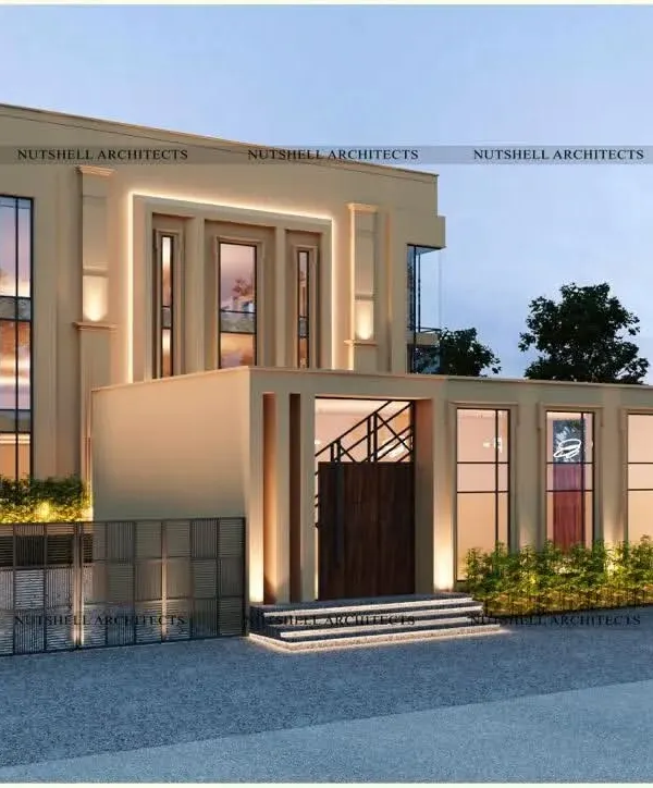 This contemporary banquet hall and restaurant is defined by an earthy, monochromatic color scheme. The facade uses strong vertical lines, large glass panels, and subtle uplighting to create an inviting and modern presence.