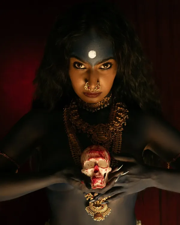 A powerful interpretation of the goddess Kali, exploring themes of fury and freedom. I used intense, focused lighting and a deep red background to create a dramatic and spiritually resonant image.
