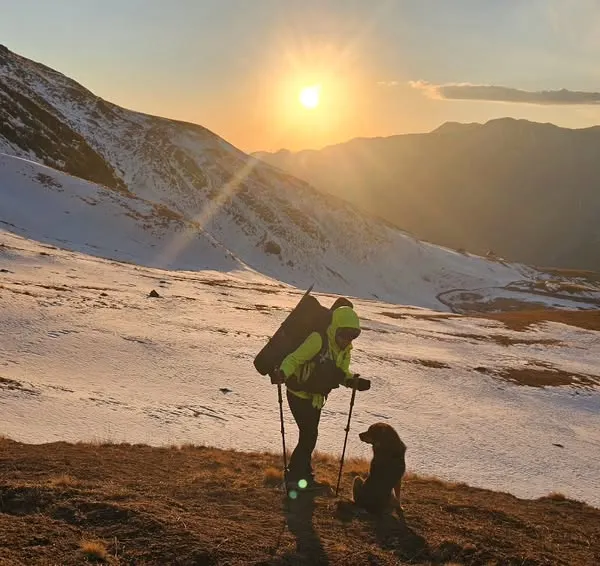 A sunrise on the trail with a four-legged companion. Solo trekking teaches you to rely on yourself and appreciate the quiet moments. Building the fitness for these journeys gives you the confidence to explore the world on your own terms.
