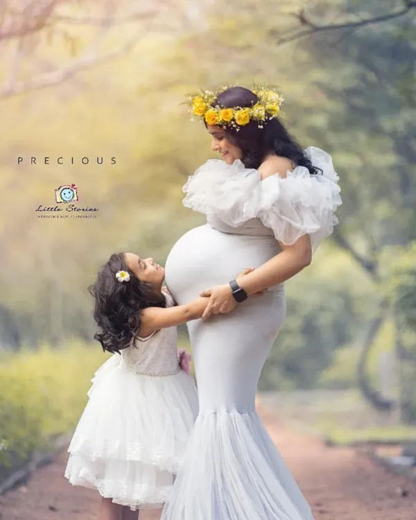 A truly precious moment during a maternity session. I love including older siblings to capture the family's excitement as they wait to meet their newest member.