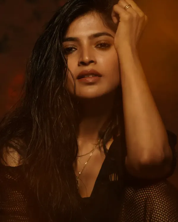 This is the kind of moody, soulful portrait I love to create. Using focused lighting and a dark background, we can capture an intense and captivating look, perfect for a powerful portfolio shot.