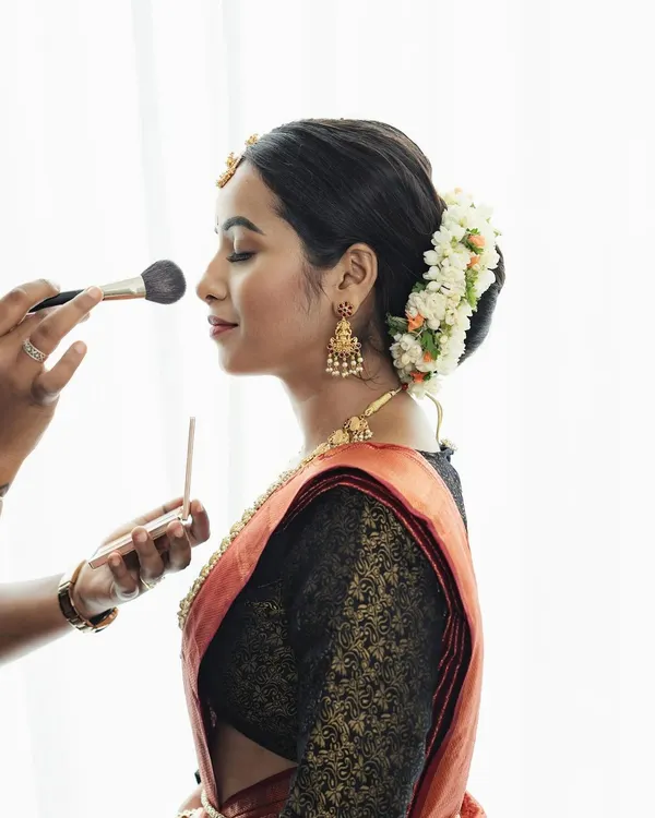 A glimpse into my process. I take great care in every step, from skin prep to the final touch of powder, ensuring a comfortable experience and a perfect, long-lasting finish for my brides.