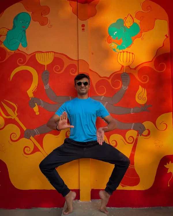 Welcome to The Punyah Theatre! I'm standing in front of the incredible mural that greets our visitors, a vibrant piece of art that sets the creative tone for our space.