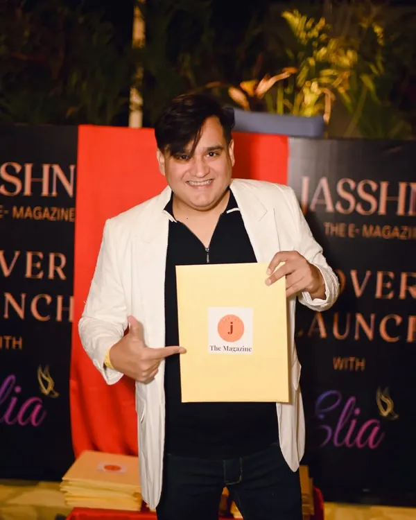 At the launch of Jasshn E-Magazine, holding a copy featuring an article about my work. I'm blessed to be recognized by fashion publications.