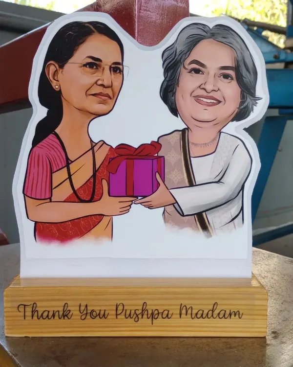 These caricature cut-outs are a fantastic way to say "thank you." Here, one was gifted to "Pushpa Madam," making for a very personal and memorable token of appreciation.