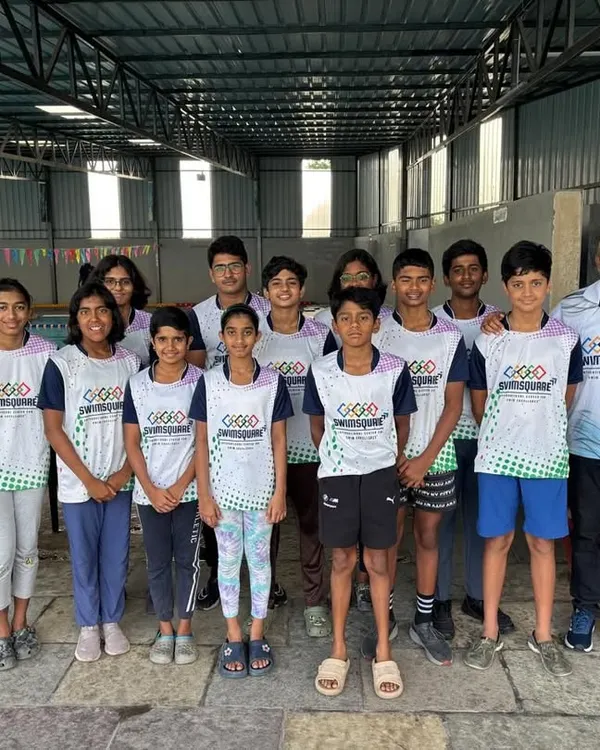 Our dedicated swimmers and coaches, ready to make waves at the NRJ State Swimming Championships. This is Team Swimsquare.