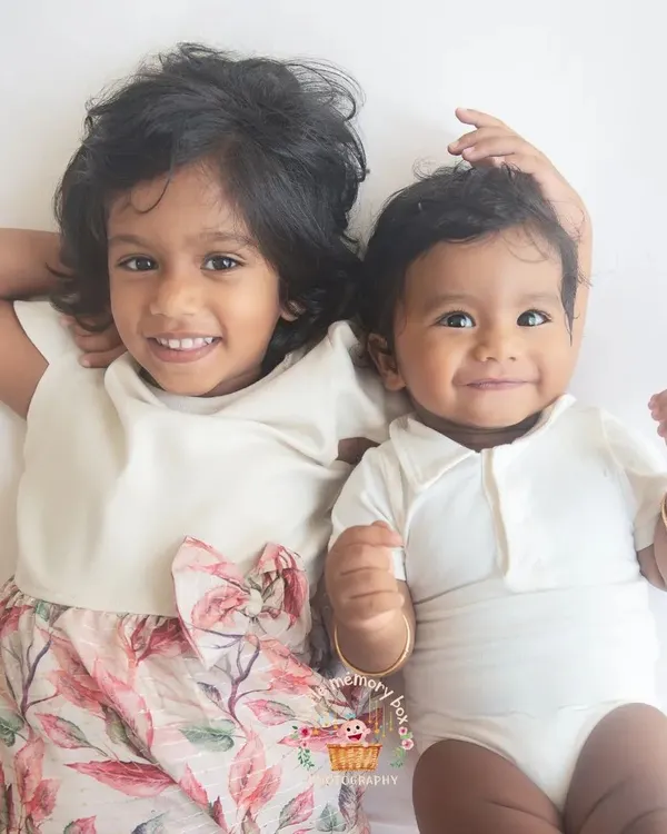 The bond between siblings is one of a kind. I love capturing these sweet, relaxed moments between them. Look at those two beautiful smiles.