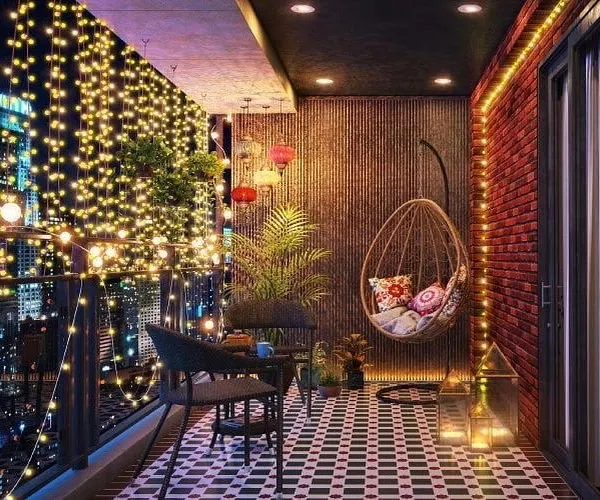This is what your evenings could look like. I designed this balcony as a cozy city escape, using layers of fairy lights to create a magical ambiance against the night sky. The comfortable swing chair and seating make it the perfect spot to unwind.