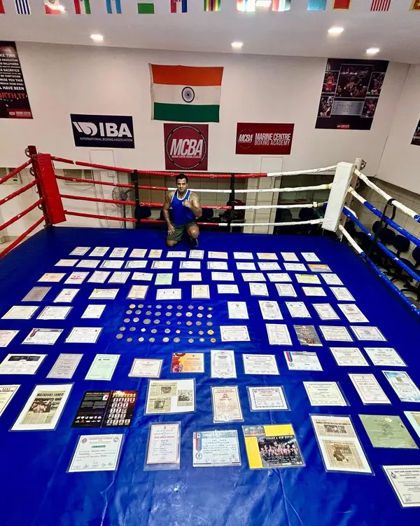 This is my journey. Over 157 fights, championships, and years of dedication laid out on the canvas. I've been in the ring, I've won, and I've learned. Now, I use this experience to train you.