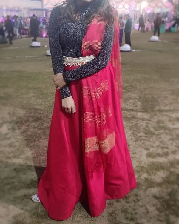 A client styled our bright red skirt with a shimmery black turtleneck for a winter wedding. This shows how you can creatively style our rental pieces to suit your personal taste and the weather.