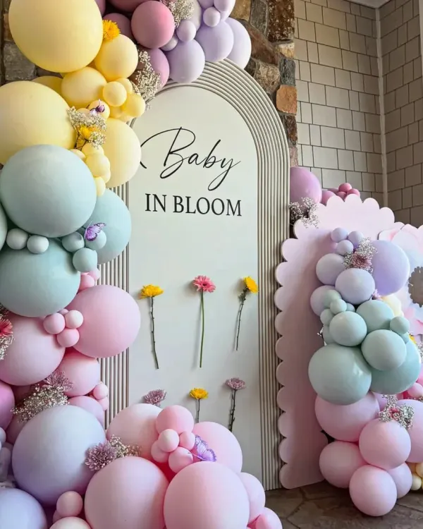 We brought this beautiful 'Baby in Bloom' theme to life with a cascade of pastel balloons and fresh flowers. This setup shows our expertise in creating modern, photo-ready backdrops that are perfect for celebrating the mom-to-be.
