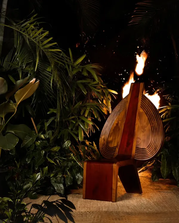 This is the Vismayam chair, a piece born from the reverence we feel for Theyyam, a ritual art form from our home state of Kerala. We aimed to capture its captivating otherworldliness, from the fiery reds of its costume to the evocative silence it commands, creating a functional piece of art that binds past and present.