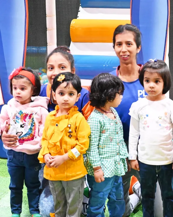 Our staff with a group of adorable toddlers during a group visit. We ensure a safe and fun time for even our smallest guests.