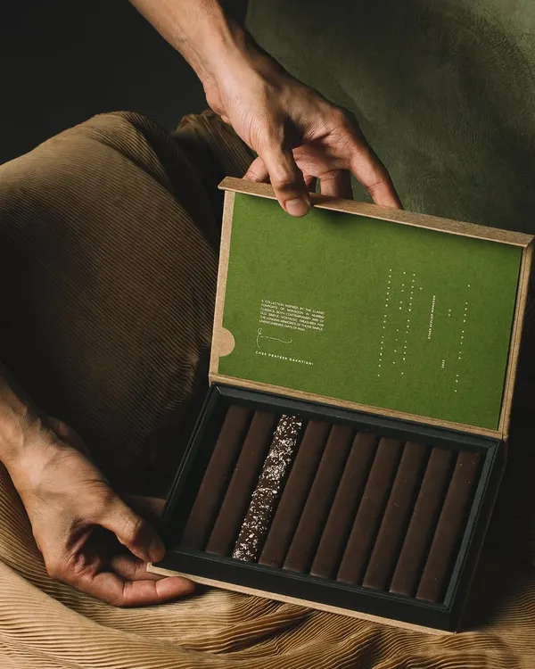 Unboxing the Old School Fudge Sticks by Chef Prateek Bakhtiani of Ether Atelier Chocolat. This box of 10 features layers of Ecuadorian salted dark chocolate and toasted coconut fudge.