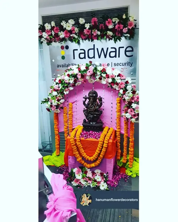 Festivals are for everyone, including at the workplace. Here is a Ganesh Chaturthi mandap I set up for the employees at Radware, featuring a beautiful floral arch and traditional marigold garlands to bring the festive spirit to the office.