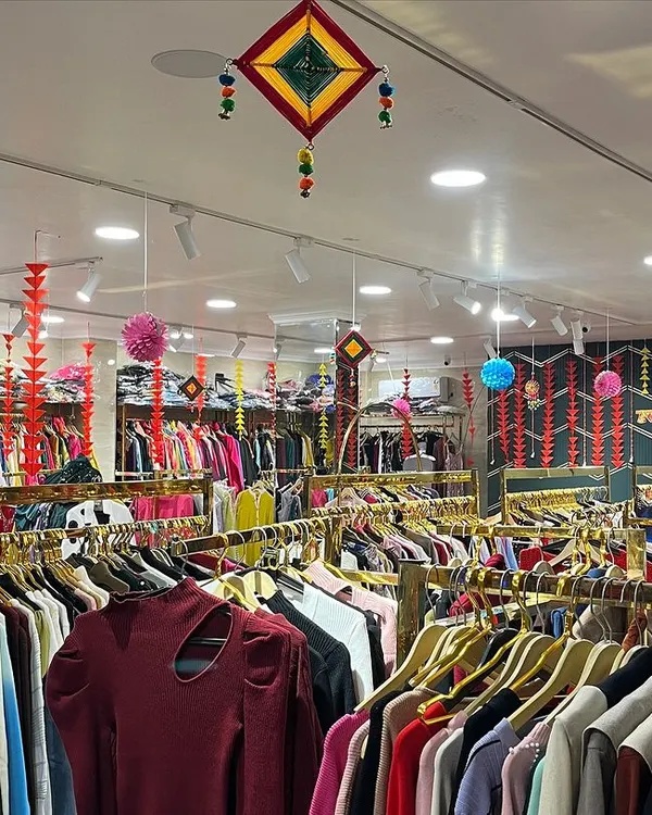 A festive Diwali decoration for a retail store. We used traditional Indian hangings, paper lanterns, and marigold garlands to create a welcoming and celebratory atmosphere for shoppers.