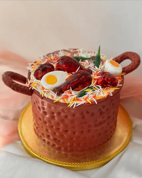Another look at my signature Biryani pot cake. It's a flavourful, layered cake completely disguised as a savoury dish, making it a fun surprise for any celebration.
