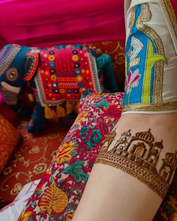 A custom armband featuring a beautiful architectural design, inspired by royal palaces. This is a unique way to adorn your arms for a special event.