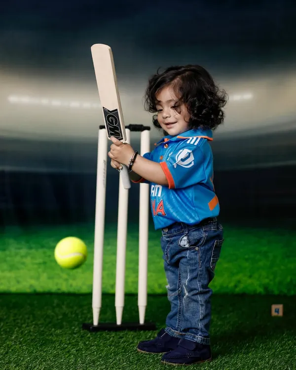 For the future cricket star. This little one is ready for his debut in a full Team India kit, complete with a bat and wickets. This cricket theme is a huge hit with sports-loving families.