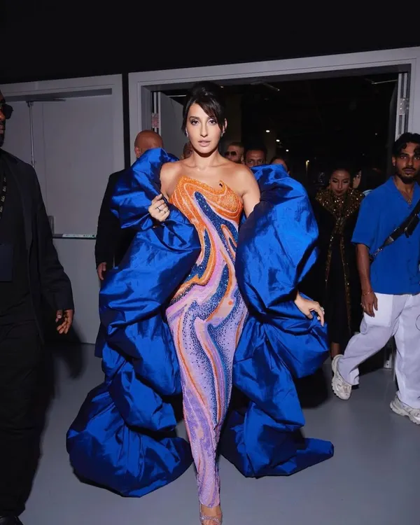 This is the kind of high-impact, dramatic look I love creating for major events. The voluminous structure and vibrant color ensure you’re not just attending the event, you are the event. This is a perfect example of fearless red carpet styling.