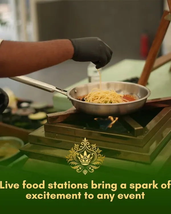 Live food stations bring a spark of excitement to any event. Here, our chef prepares fresh pasta to order, providing guests with an interactive and personalized culinary experience.