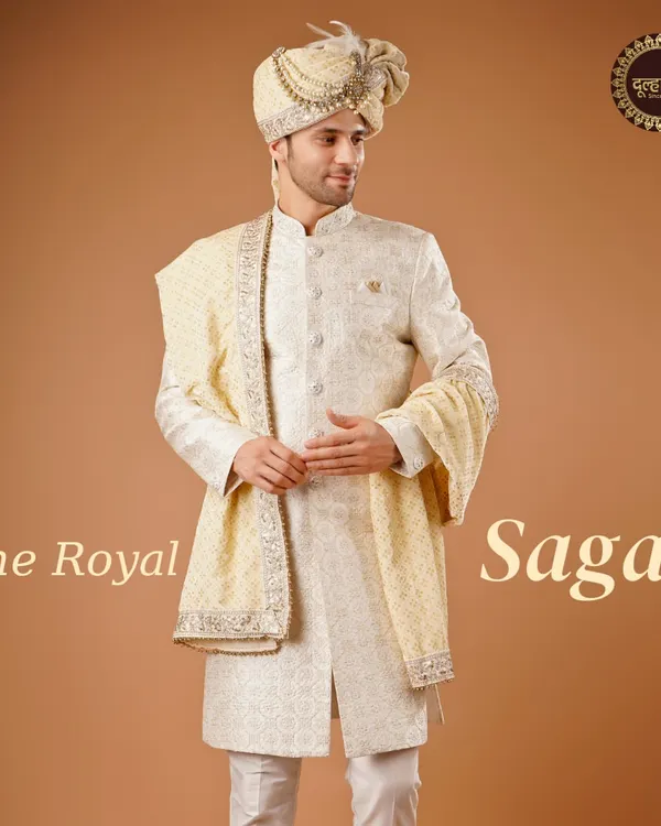 I believe every groom's story deserves a royal beginning. This custom off-white sherwani, paired with a matching safa and shawl, is crafted to create a timeless, majestic presence for your most important day.