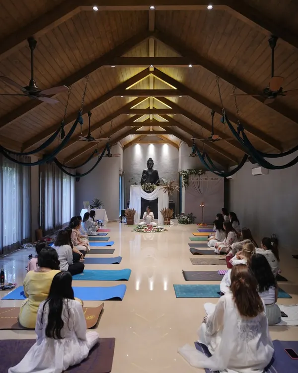 A wide view of a recent workshop, where we explored the connection between yoga and hormone health. The energy of a group practicing together creates a powerful environment for learning and transformation.