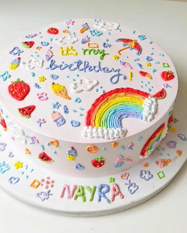 Another view of the beautiful, hand-piped doodle art cake, showing the details that wrap all the way around the tiers.