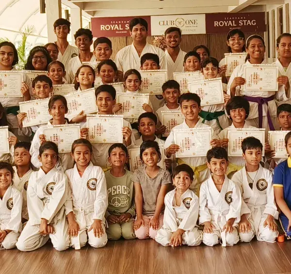 A proud moment for our entire Virar branch. This is what community and shared success look like, with dozens of students celebrating their new belts and certificates together after a grading event.
