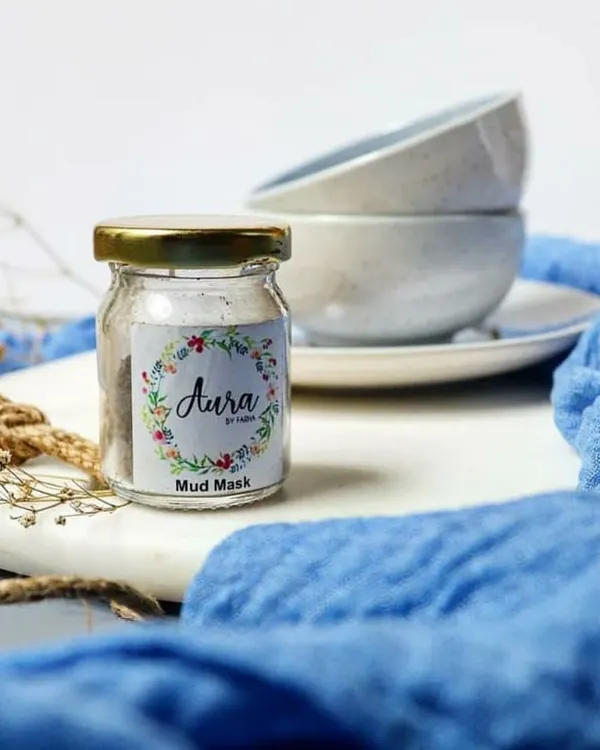 This is my special homemade mud mask. It's a blend of volcanic clays like calamine and bentonite, mixed with dried herbs like rose petal and orange peel powder to detoxify and brighten your skin.