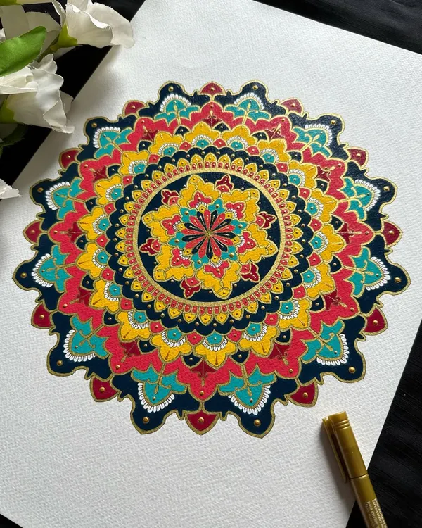 This ornate mandala is a symphony of primary colors: red, yellow, and blue, accented with deep navy and gold. Painted on A3 paper, its vibrant and detailed design is perfect for making a statement in any living space.