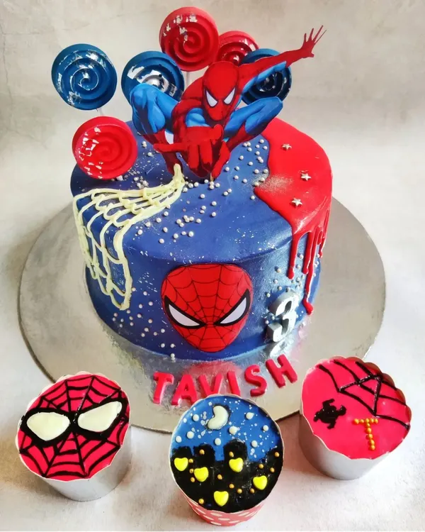 This custom Spiderman cake and matching cupcakes were a dream to create for a little hero's third birthday. I love bringing your favourite characters to life with vibrant, 100% eggless pineapple cake and white chocolate ganache.